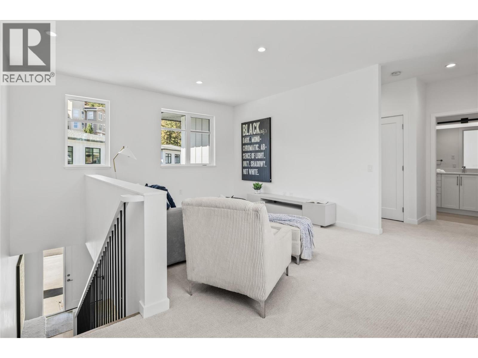 Flex space - Photo of a similar home in the community. - 1979 Country Club Drive Unit# 9, Kelowna, BC - Indoor Photo Showing Other Room