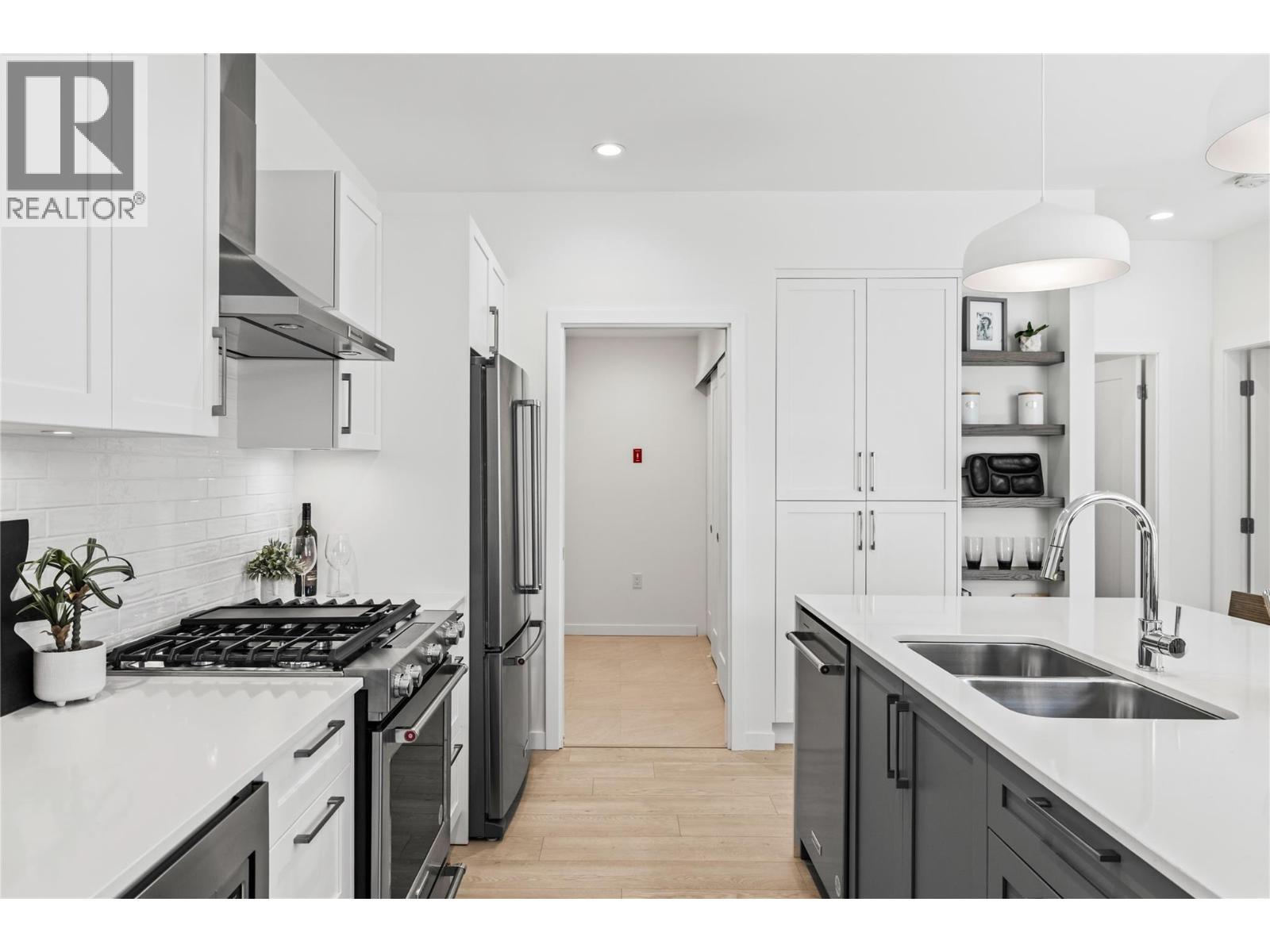 Kitchen - Photo of a similar home in the community. - 1979 Country Club Drive Unit# 9, Kelowna, BC - Indoor Photo Showing Kitchen With Double Sink With Upgraded Kitchen