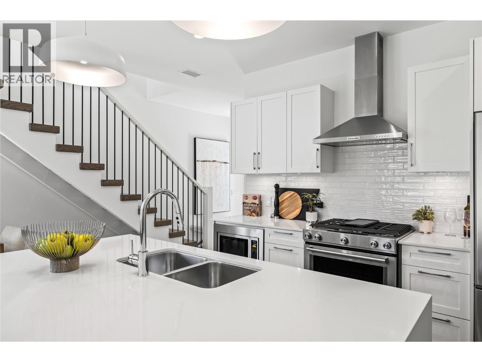 Kitchen - Photo of a similar home in the community. - 1979 Country Club Drive Unit# 9, Kelowna, BC - Indoor Photo Showing Kitchen With Double Sink With Upgraded Kitchen