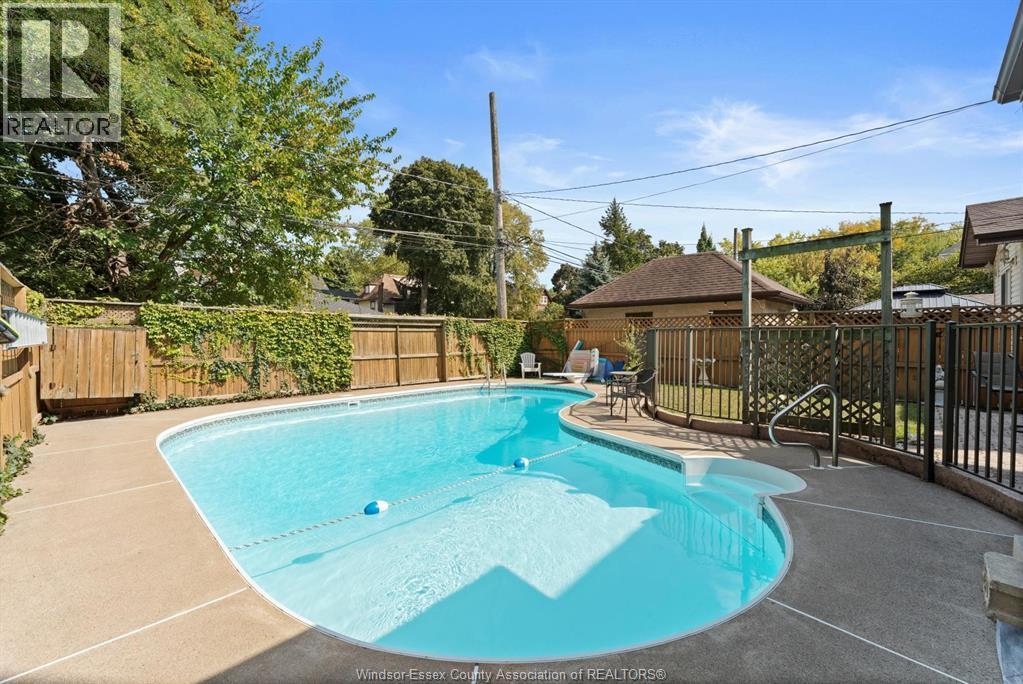 858 Chilver Road, Windsor, ON - Outdoor With In Ground Pool With Backyard