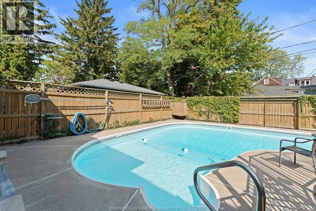 858 Chilver Road, Windsor, ON - Outdoor With In Ground Pool With Backyard
