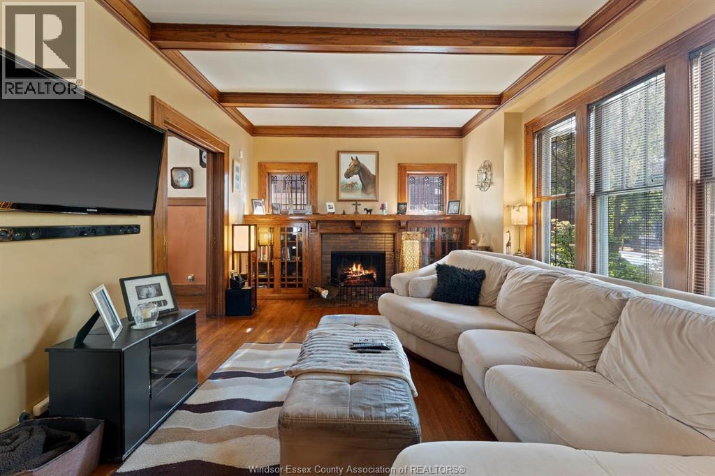858 Chilver Road, Windsor, ON - Indoor Photo Showing Living Room With Fireplace