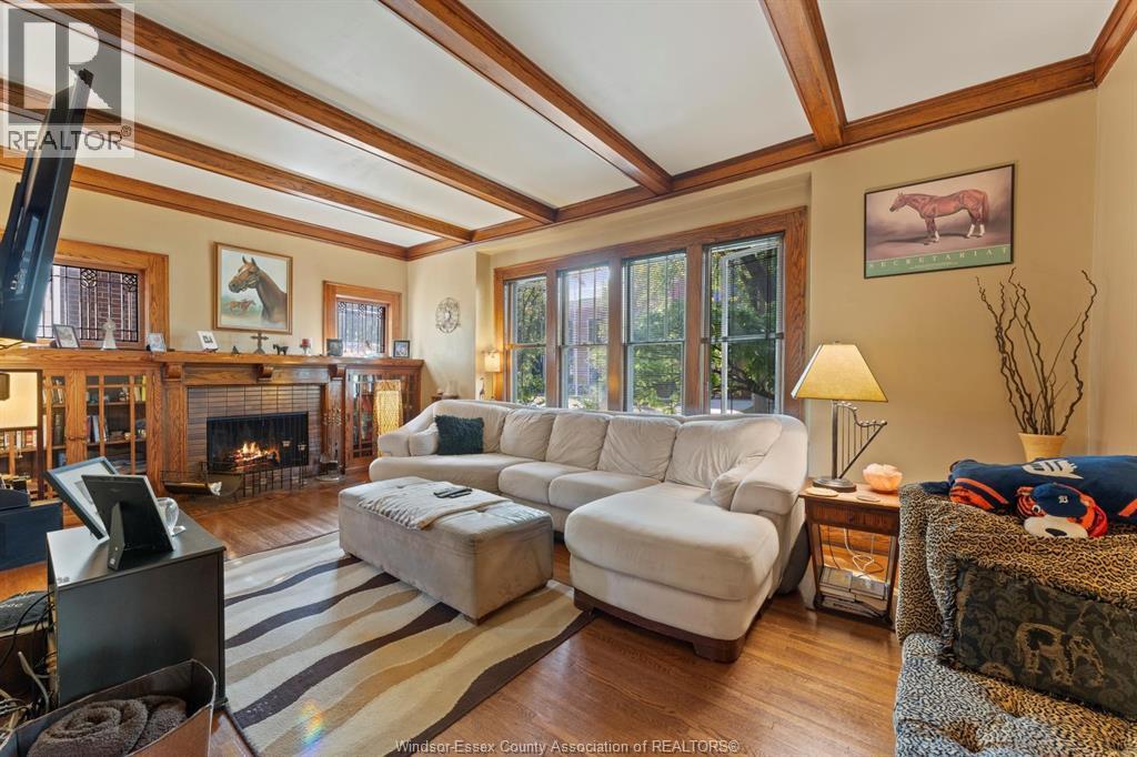858 Chilver Road, Windsor, ON - Indoor Photo Showing Living Room With Fireplace