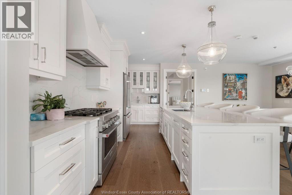 14400 Tecumseh Road Unit# 209, Tecumseh, ON - Indoor Photo Showing Kitchen With Upgraded Kitchen