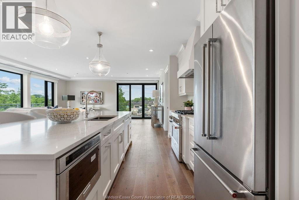 14400 Tecumseh Road Unit# 209, Tecumseh, ON - Indoor Photo Showing Kitchen With Double Sink With Upgraded Kitchen