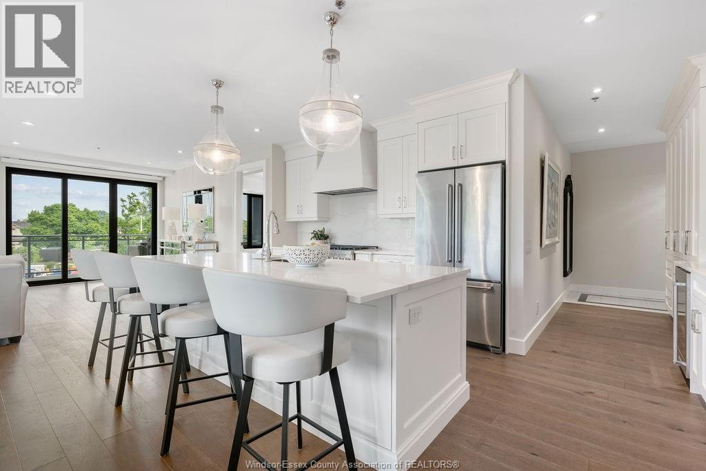 14400 Tecumseh Road Unit# 209, Tecumseh, ON - Indoor Photo Showing Kitchen With Upgraded Kitchen