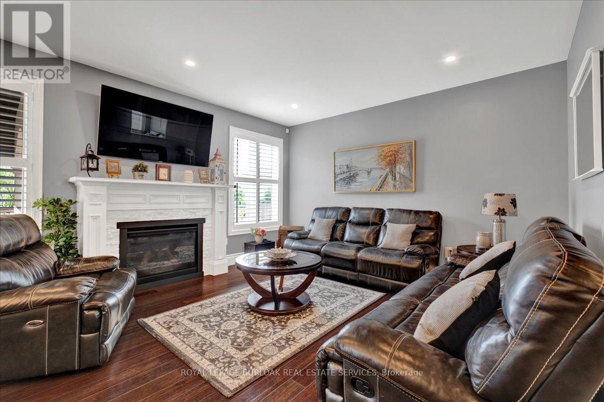 89 Eleanor Avenue, Hamilton, ON - Indoor Photo Showing Living Room With Fireplace