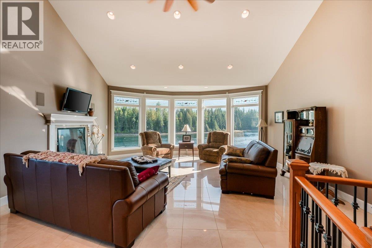 48-7126 Highway 3A Highway, Nelson, BC - Indoor Photo Showing Living Room With Fireplace