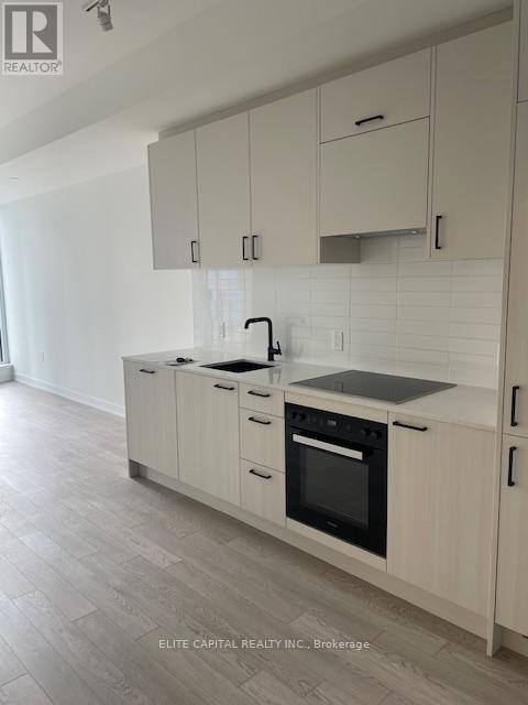 303 - 1 Kyle Lowry Road, Toronto, ON - Indoor Photo Showing Kitchen