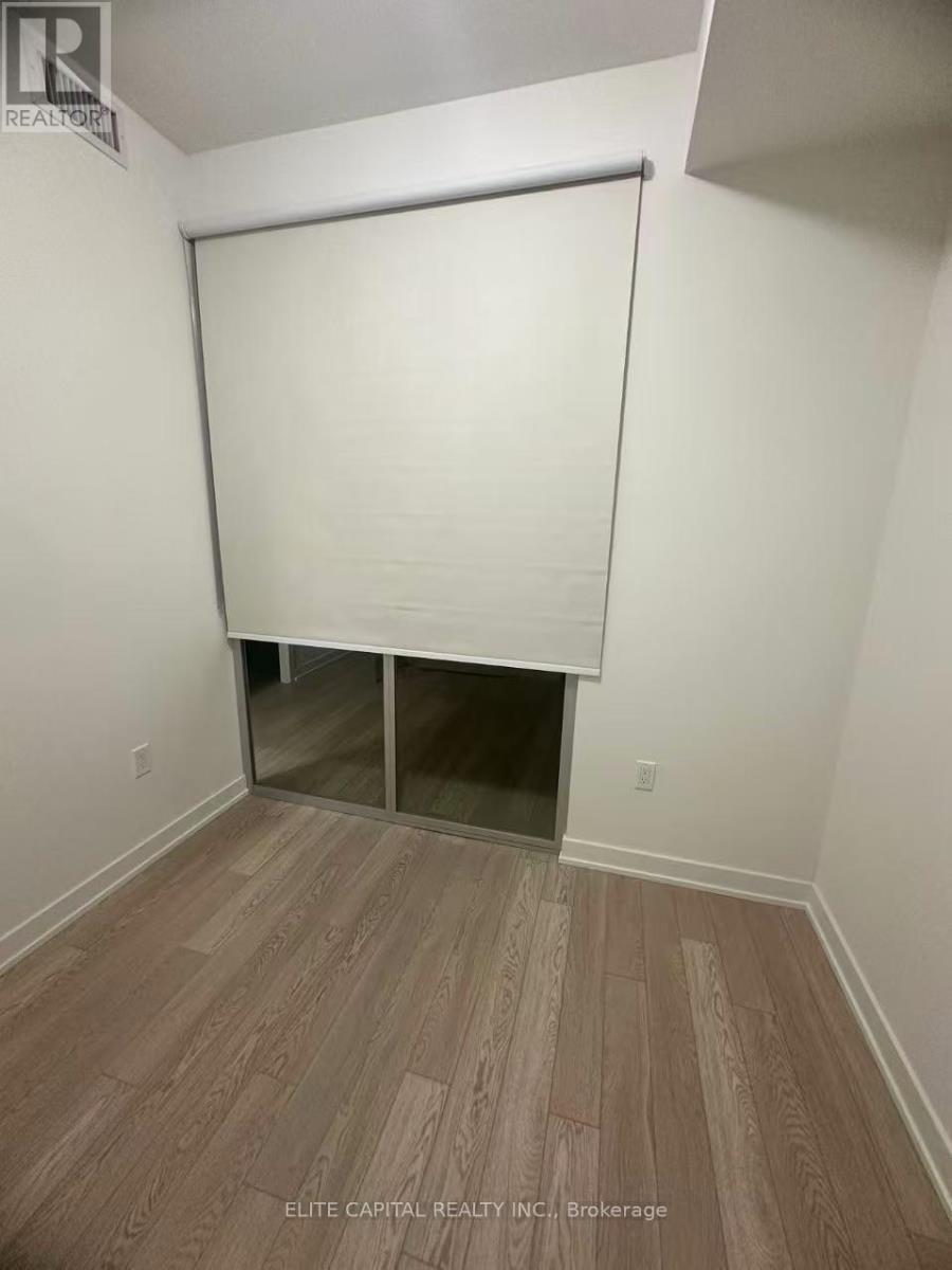 Roller Shade 2nd bedroom - 303 - 1 Kyle Lowry Road, Toronto, ON - Indoor Photo Showing Other Room