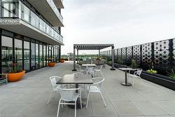 View of patio featuring outdoor dining space -