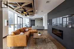 Building lobby featuring recessed lighting and coffered ceiling -