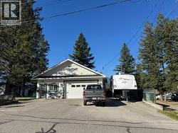 Front of house and garage from street; 7369 Prospector Avenue -