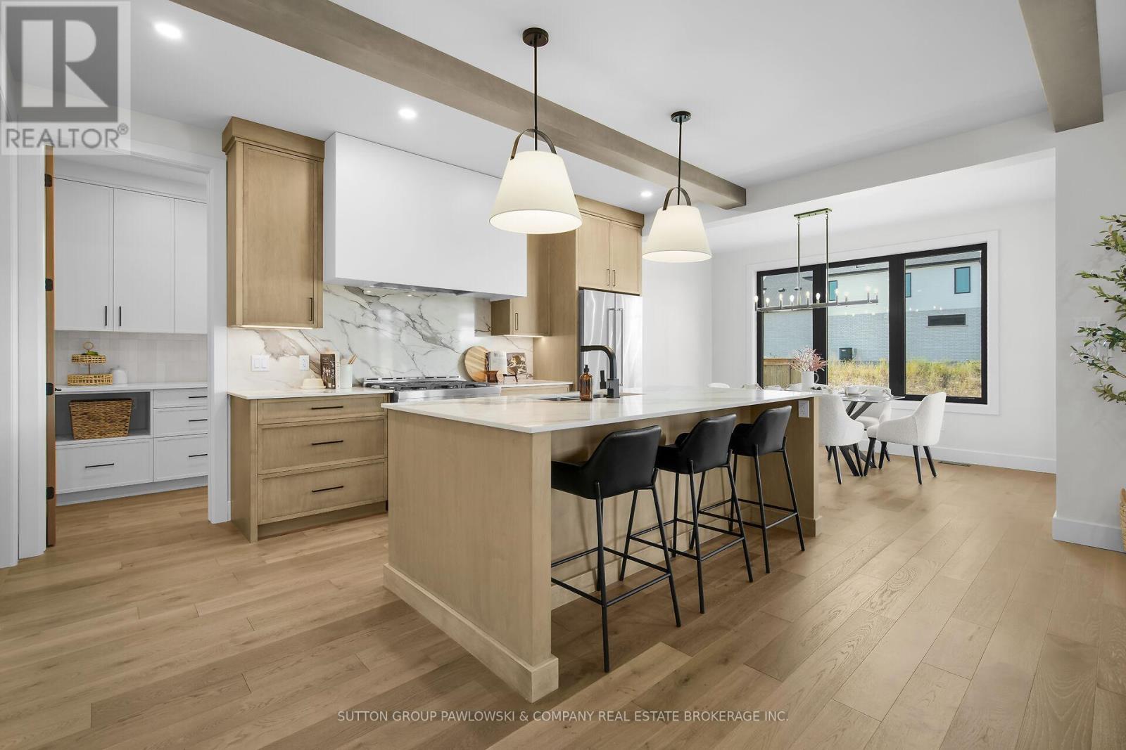 Lot 67 - 40 Benner Boulevard, Middlesex Centre, ON - Indoor Photo Showing Kitchen With Upgraded Kitchen