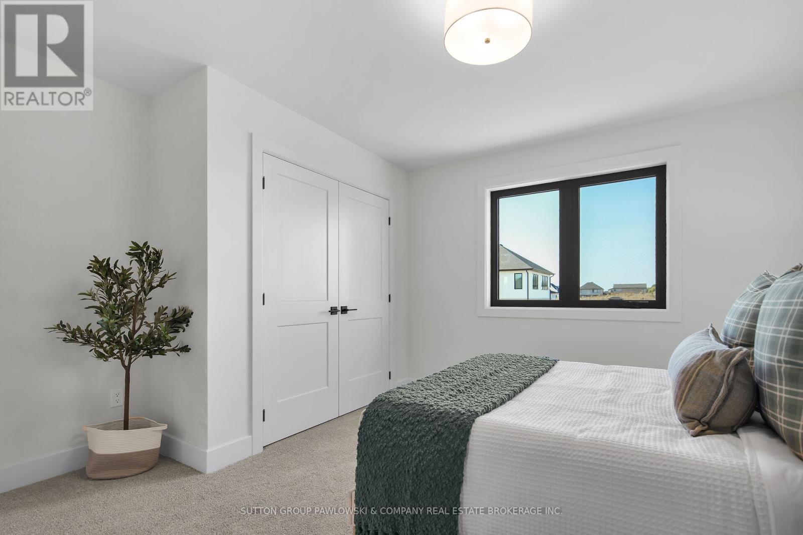 Lot 67 - 40 Benner Boulevard, Middlesex Centre, ON - Indoor Photo Showing Bedroom