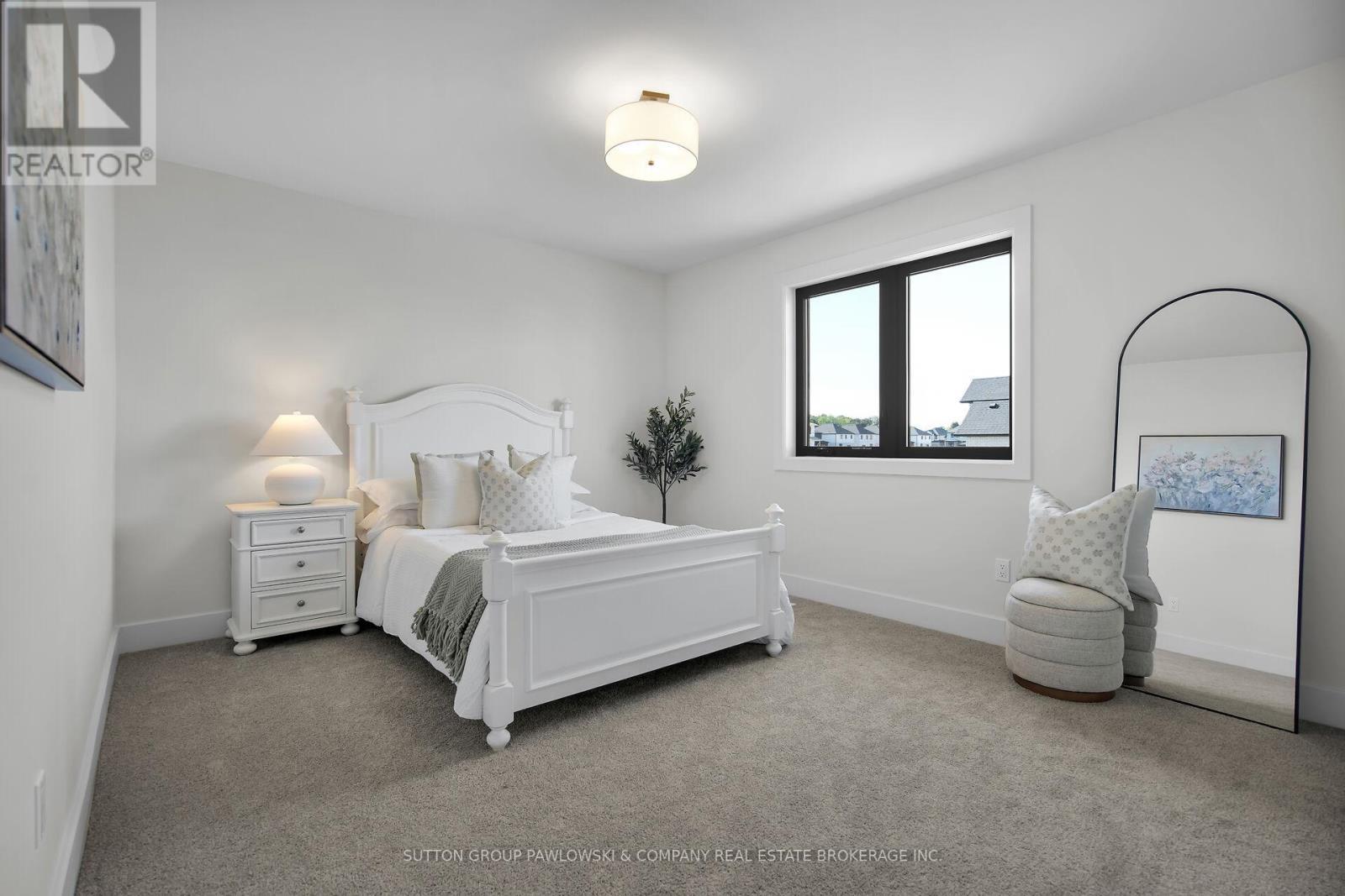 Lot 67 - 40 Benner Boulevard, Middlesex Centre, ON - Indoor Photo Showing Bedroom