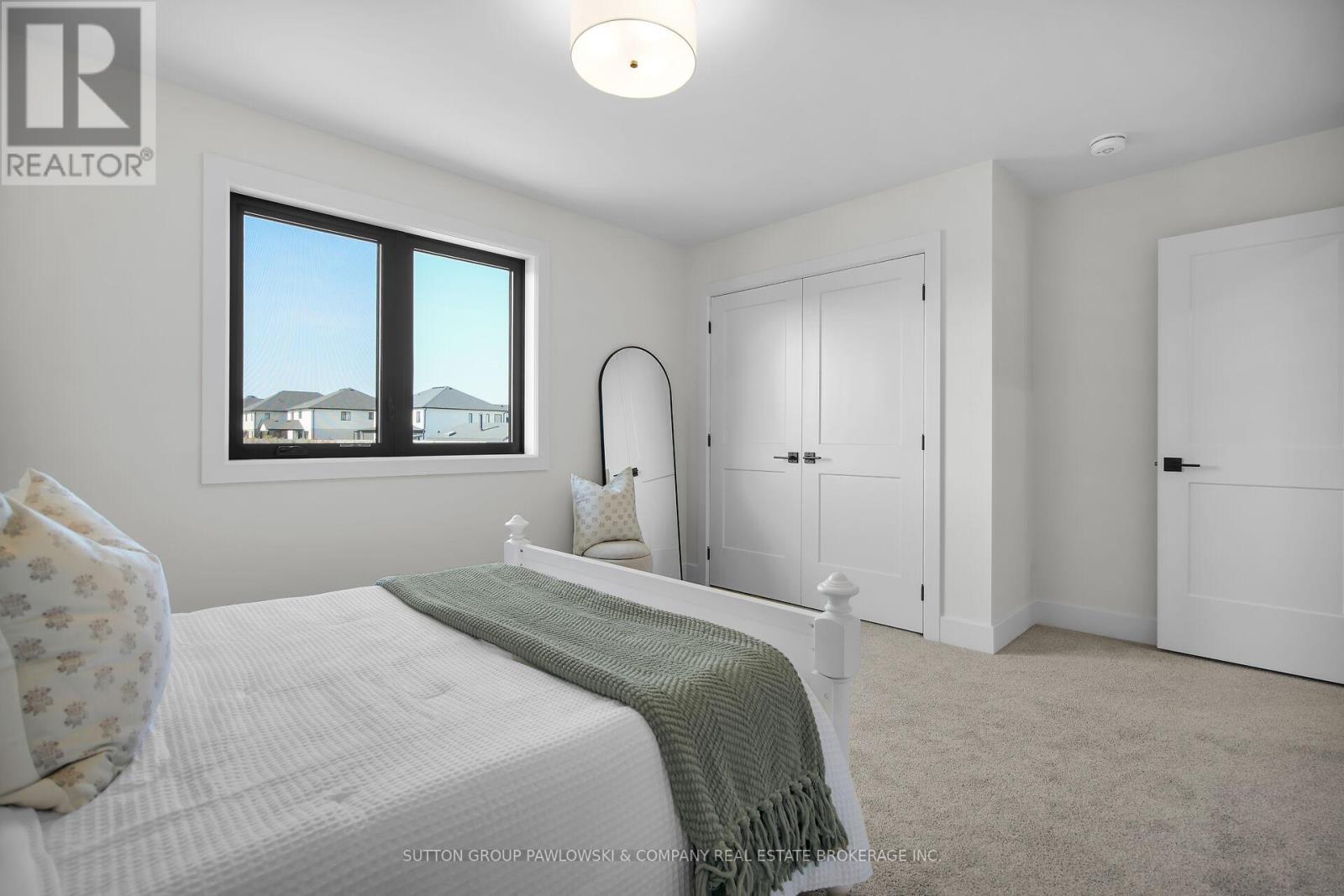 Lot 67 - 40 Benner Boulevard, Middlesex Centre, ON - Indoor Photo Showing Bedroom