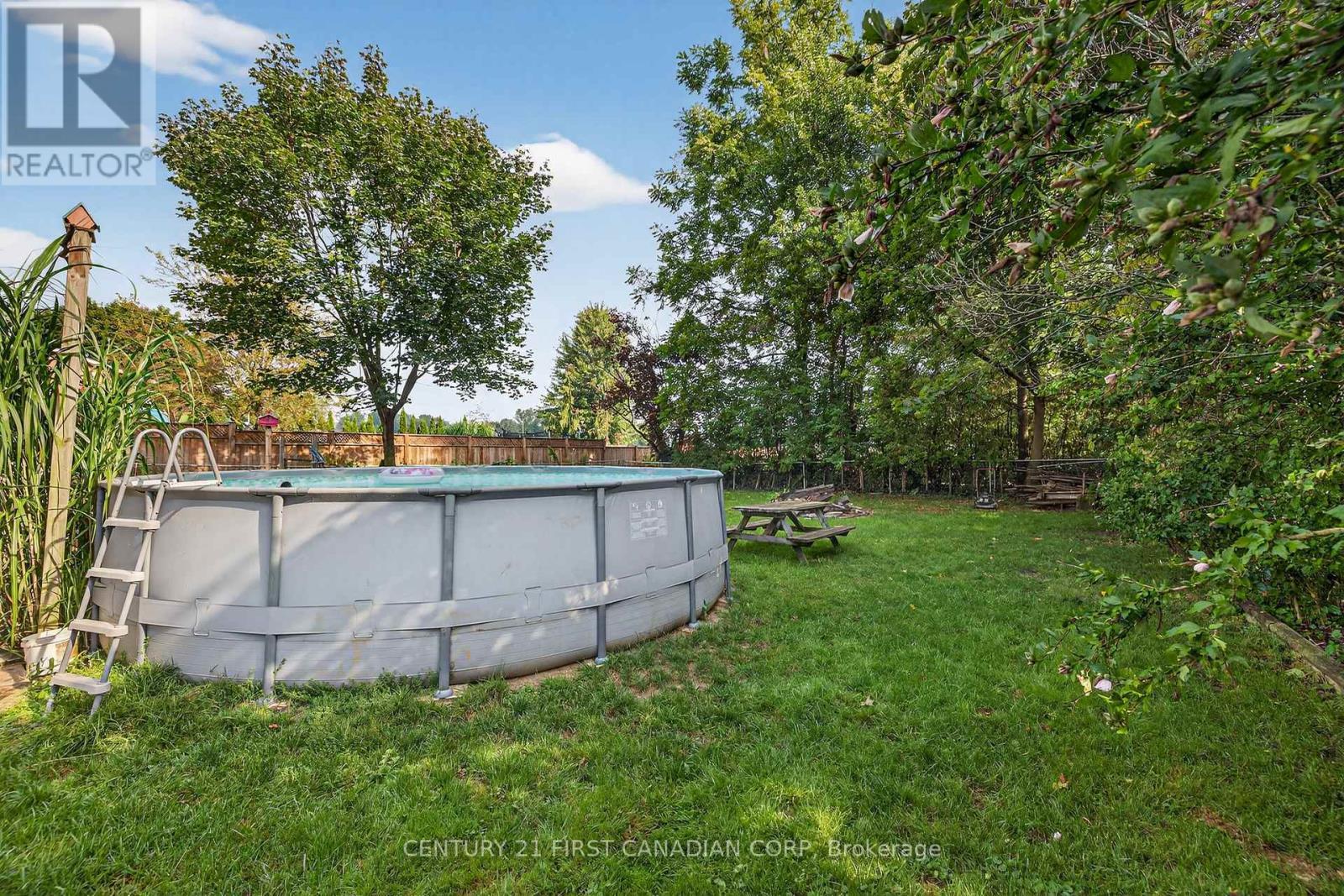 247 Ridout Street, West Elgin (Rodney), ON - Outdoor With Above Ground Pool