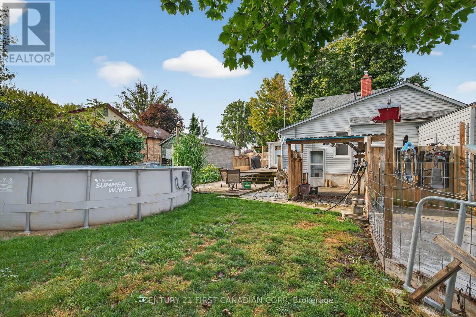 247 Ridout Street, West Elgin (Rodney), ON - Outdoor With Above Ground Pool