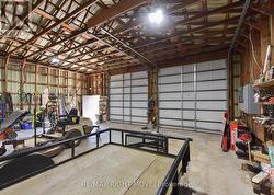 2 bays located at the front of the shop - -