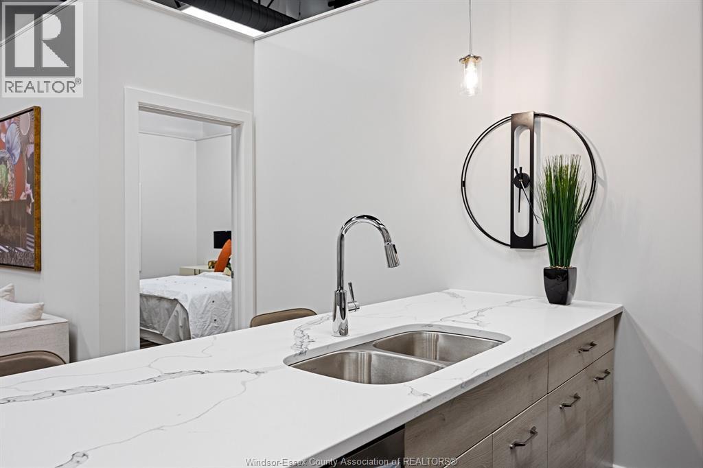 800 Beachside Drive Unit# 309, Lakeshore, ON - Indoor Photo Showing Kitchen With Double Sink