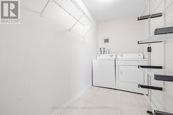 Ensuite Laundry Rm with storage -
