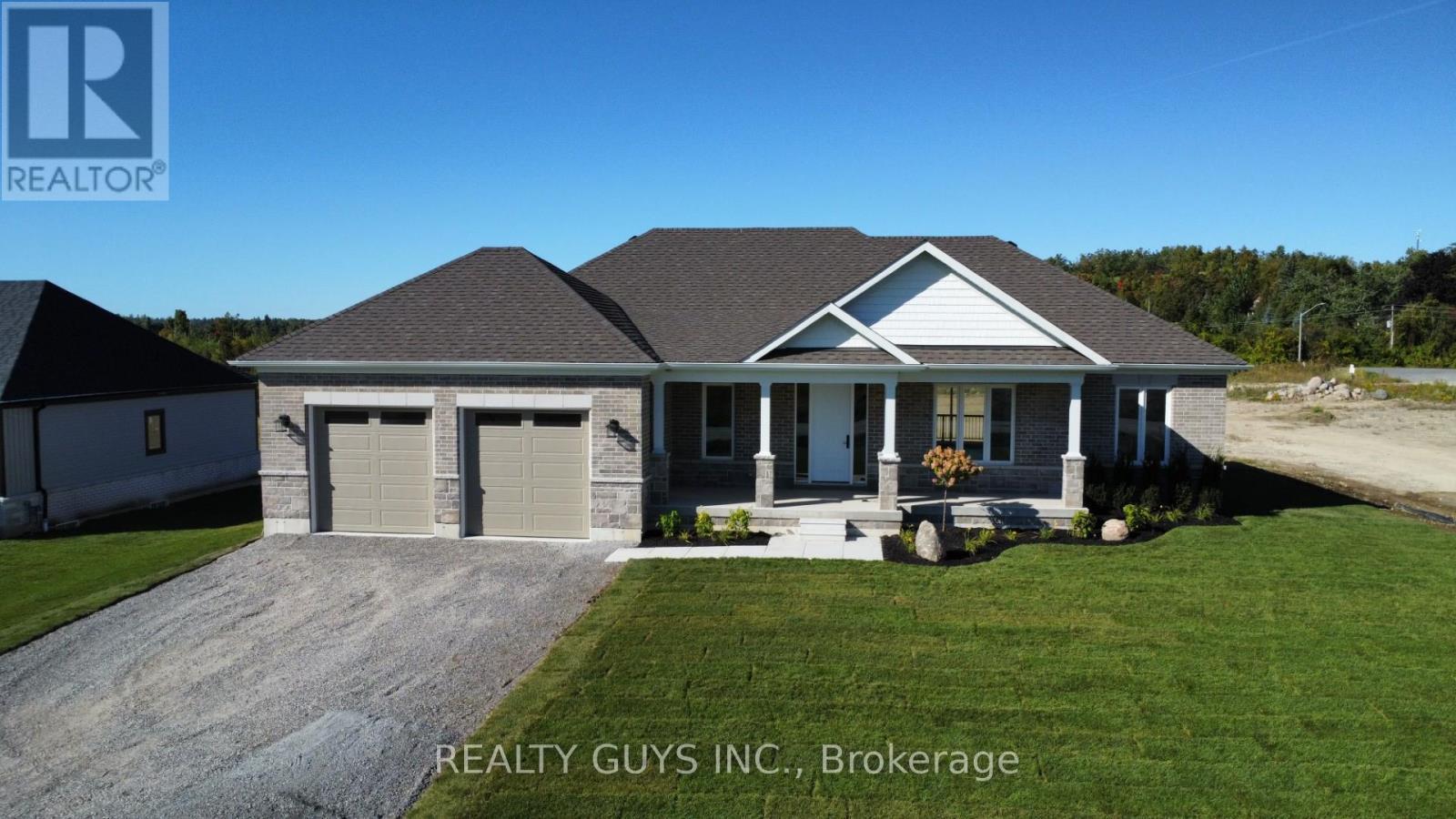 MODEL HOME for subdivision--ALSO FOR SALE OR BUILD - 2418 Gwendolyn Court, Cavan Monaghan (Cavan Twp), ON - Outdoor With Deck Patio Veranda With Facade