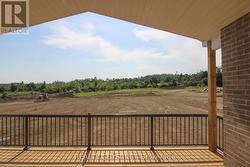 REAR COVERED DECK TO HUGE REAR YARD -