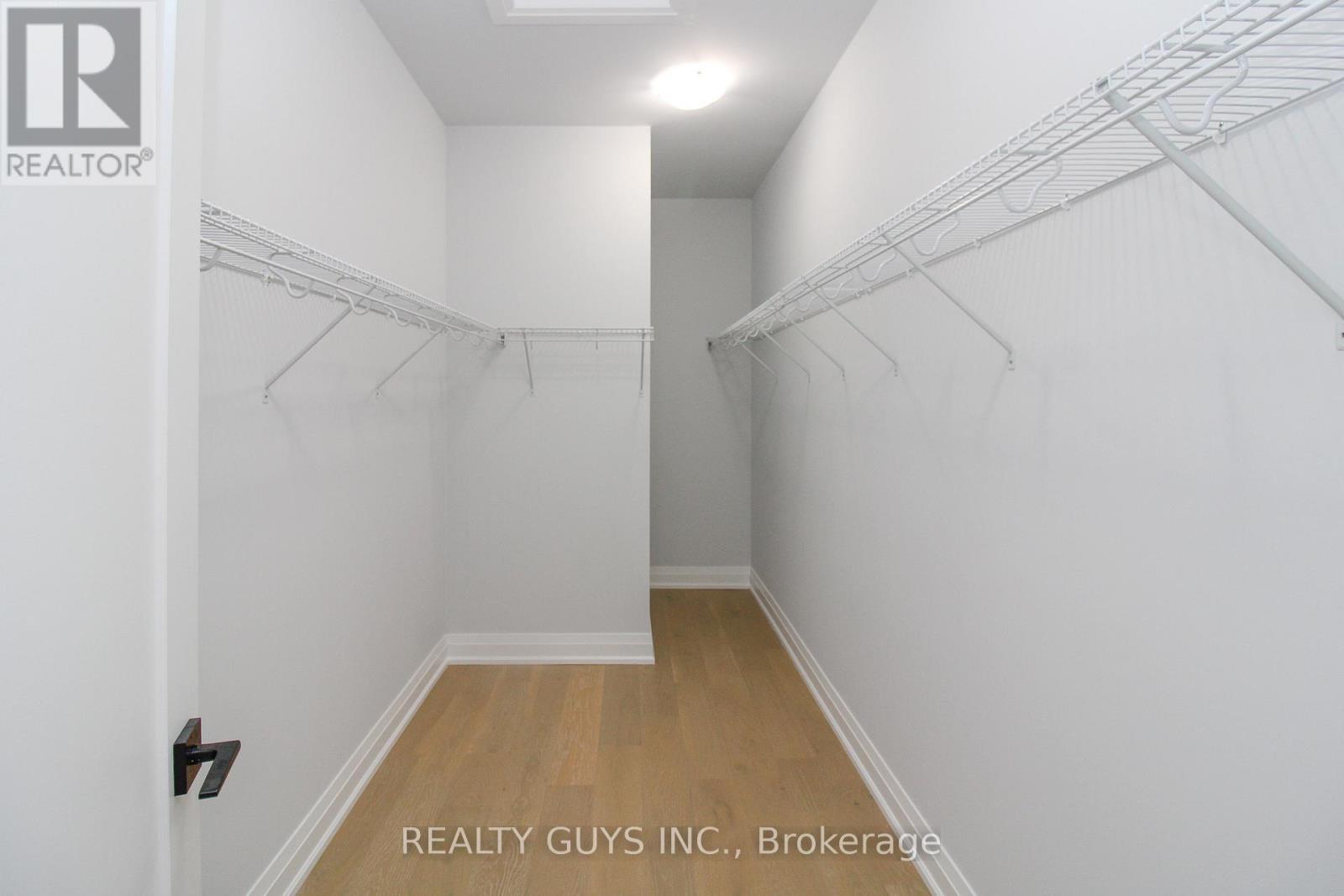 PRIMARY BEDROOM WALK-IN CLOSET - 2418 Gwendolyn Court, Cavan Monaghan (Cavan Twp), ON - Indoor With Storage