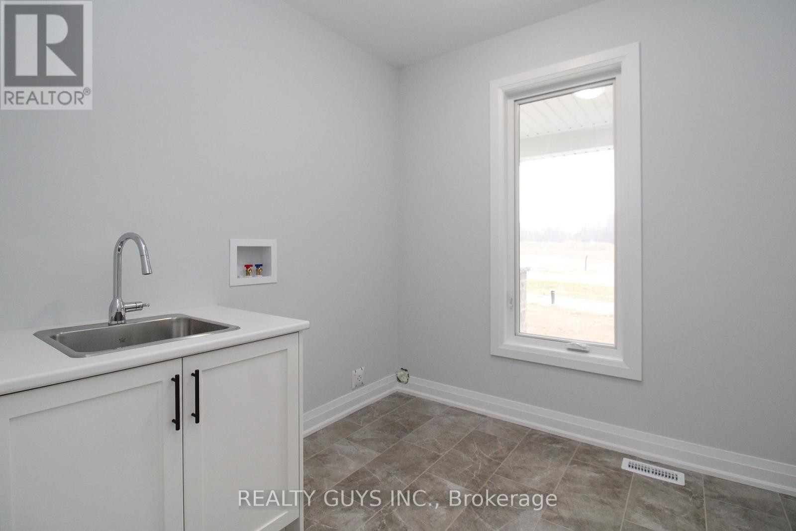 LAUNDRY--ACROSS FROM PRIMARY BEDROOM - 2418 Gwendolyn Court, Cavan Monaghan (Cavan Twp), ON - Indoor Photo Showing Other Room