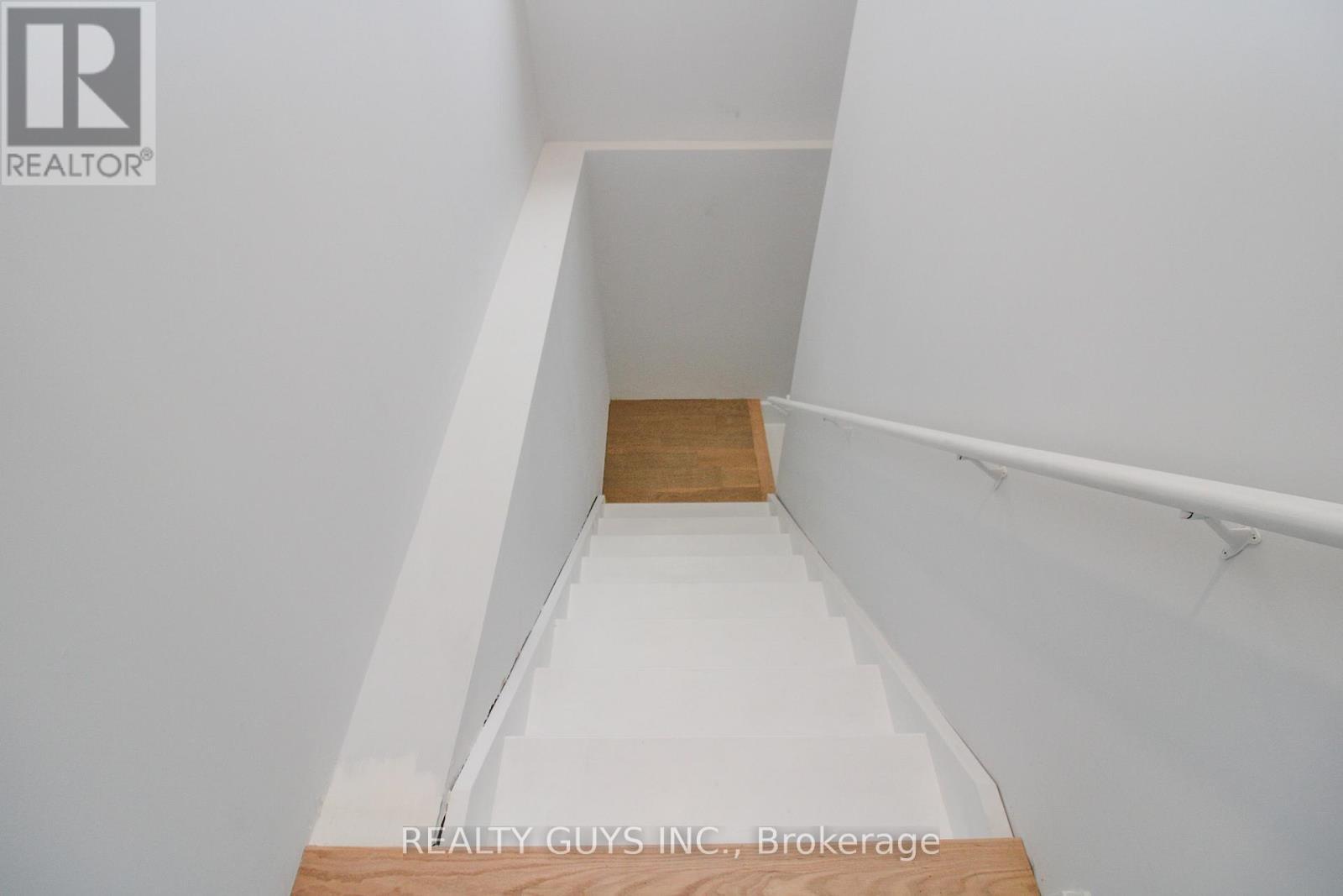 STAIRS TO LOWER BRIGHT AREA - 2418 Gwendolyn Court, Cavan Monaghan (Cavan Twp), ON - Indoor Photo Showing Other Room