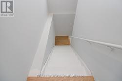 STAIRS TO LOWER BRIGHT AREA -