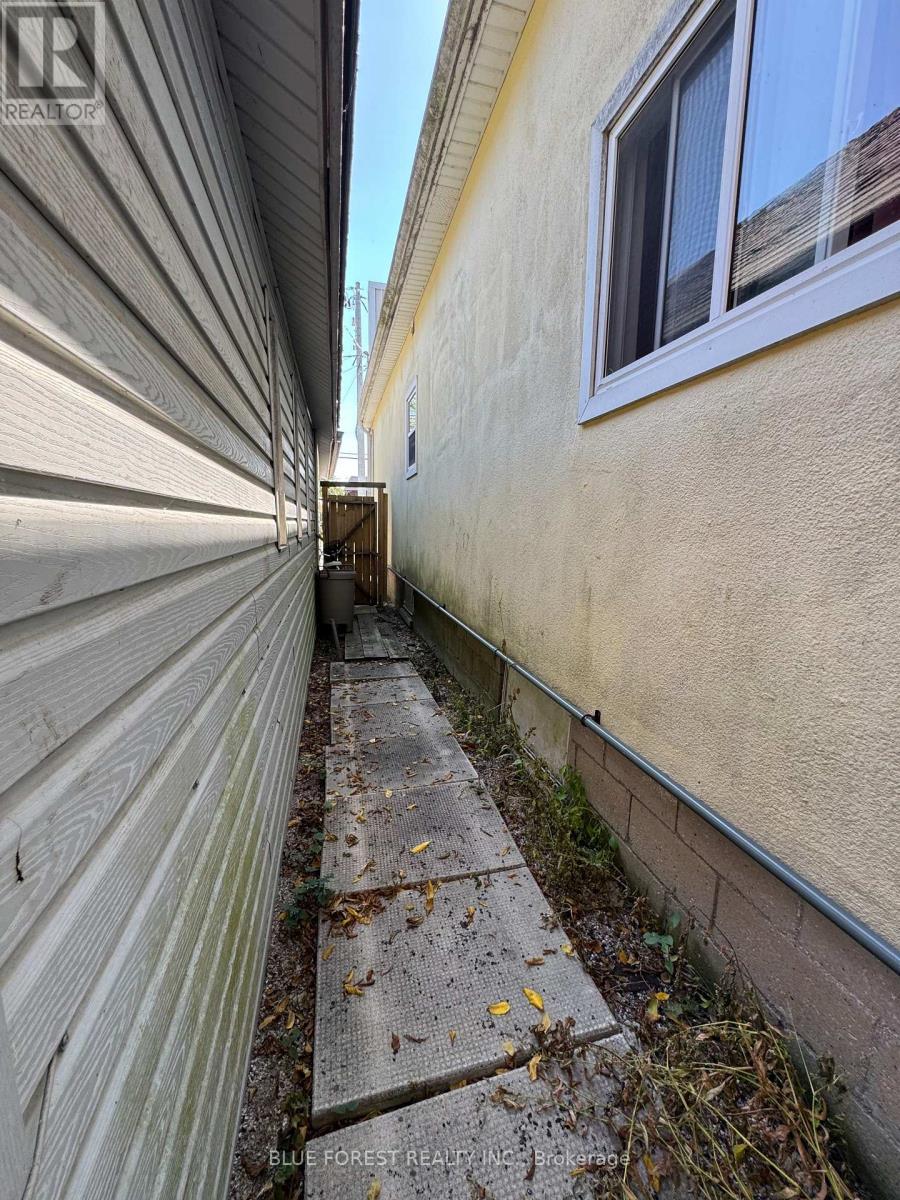 Side entry to apartment - 23 Wellington Street, Bayham (Port Burwell), ON