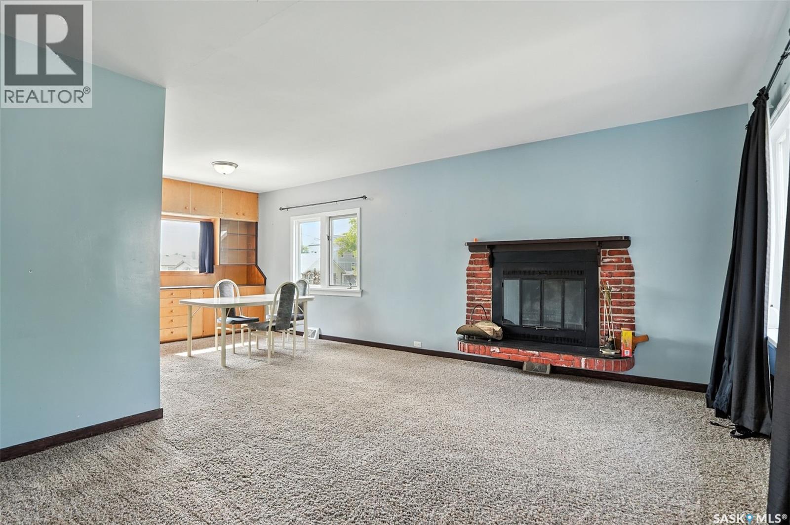 106 3Rd Avenue E, Nokomis, SK - Indoor Photo Showing Living Room With Fireplace