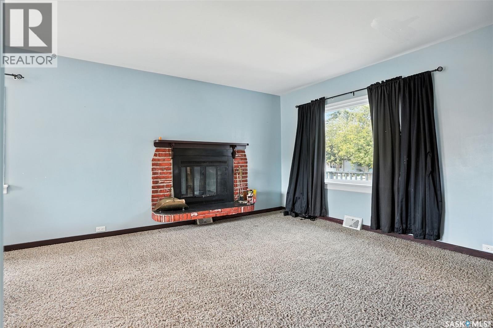 106 3Rd Avenue E, Nokomis, SK - Indoor With Fireplace