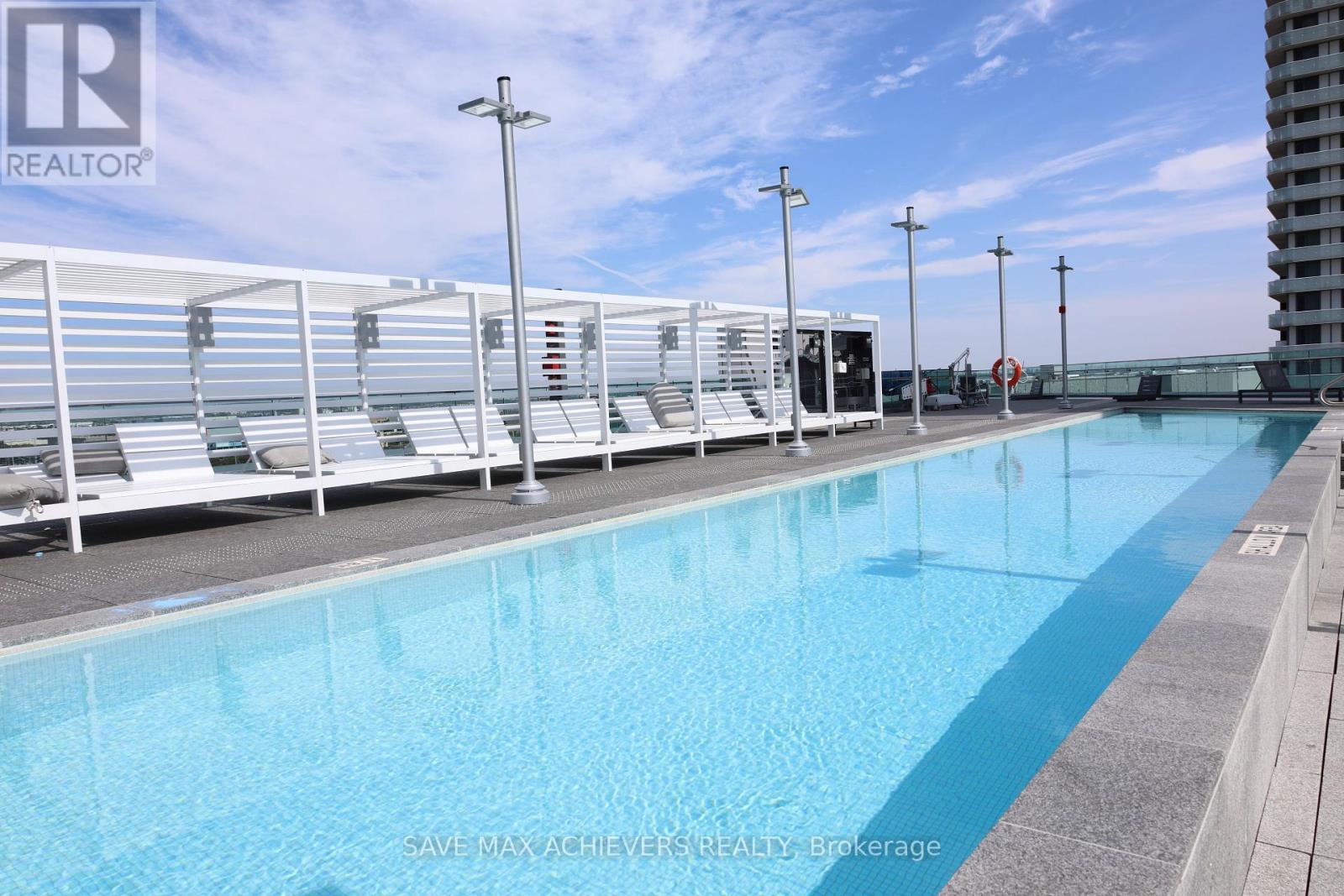 5201 - 7890 Jane Street, Vaughan, ON - Photo Showing Other Room With In Ground Pool