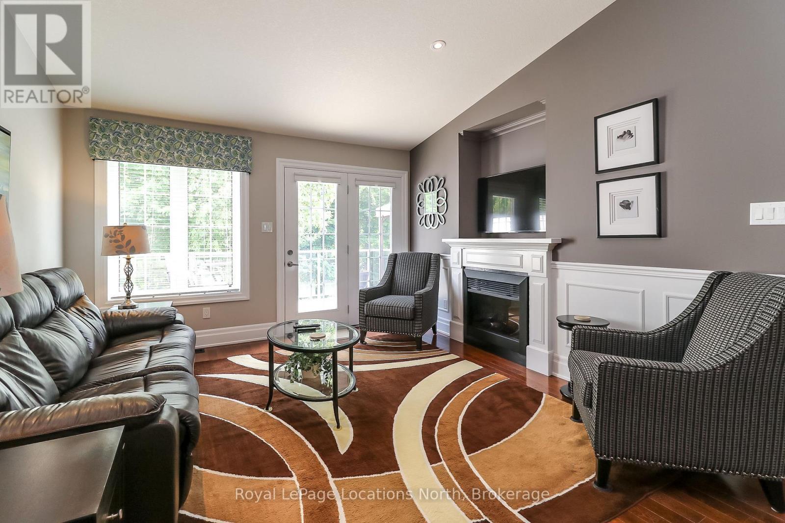 67 Greenway Drive, Wasaga Beach, ON - Indoor Photo Showing Living Room With Fireplace