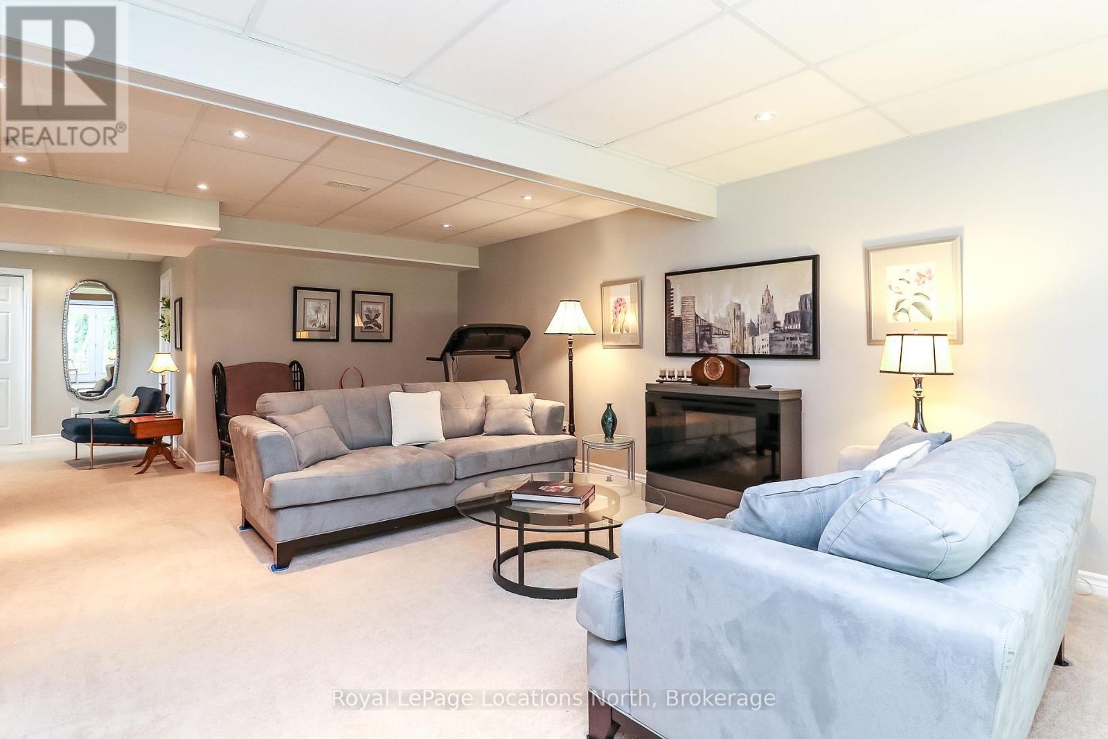 67 Greenway Drive, Wasaga Beach, ON - Indoor Photo Showing Living Room With Fireplace