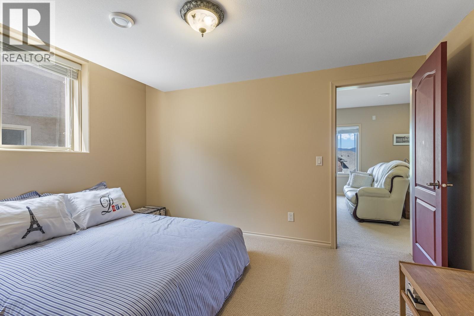 610 Arrowleaf Lane, Kelowna, BC - Indoor Photo Showing Bedroom