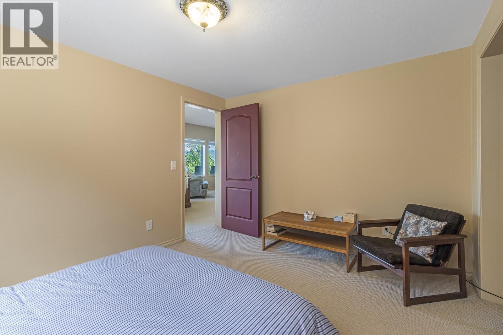 610 Arrowleaf Lane, Kelowna, BC - Indoor Photo Showing Bedroom