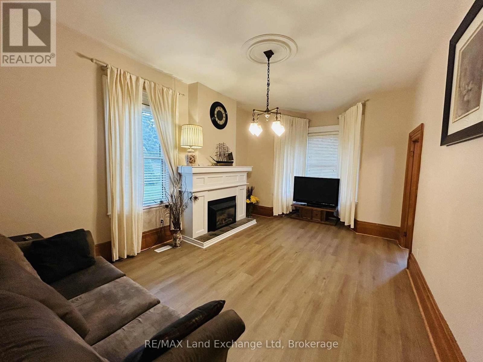 81 Patrick Street E, North Huron (Wingham), ON - Indoor Photo Showing Living Room With Fireplace
