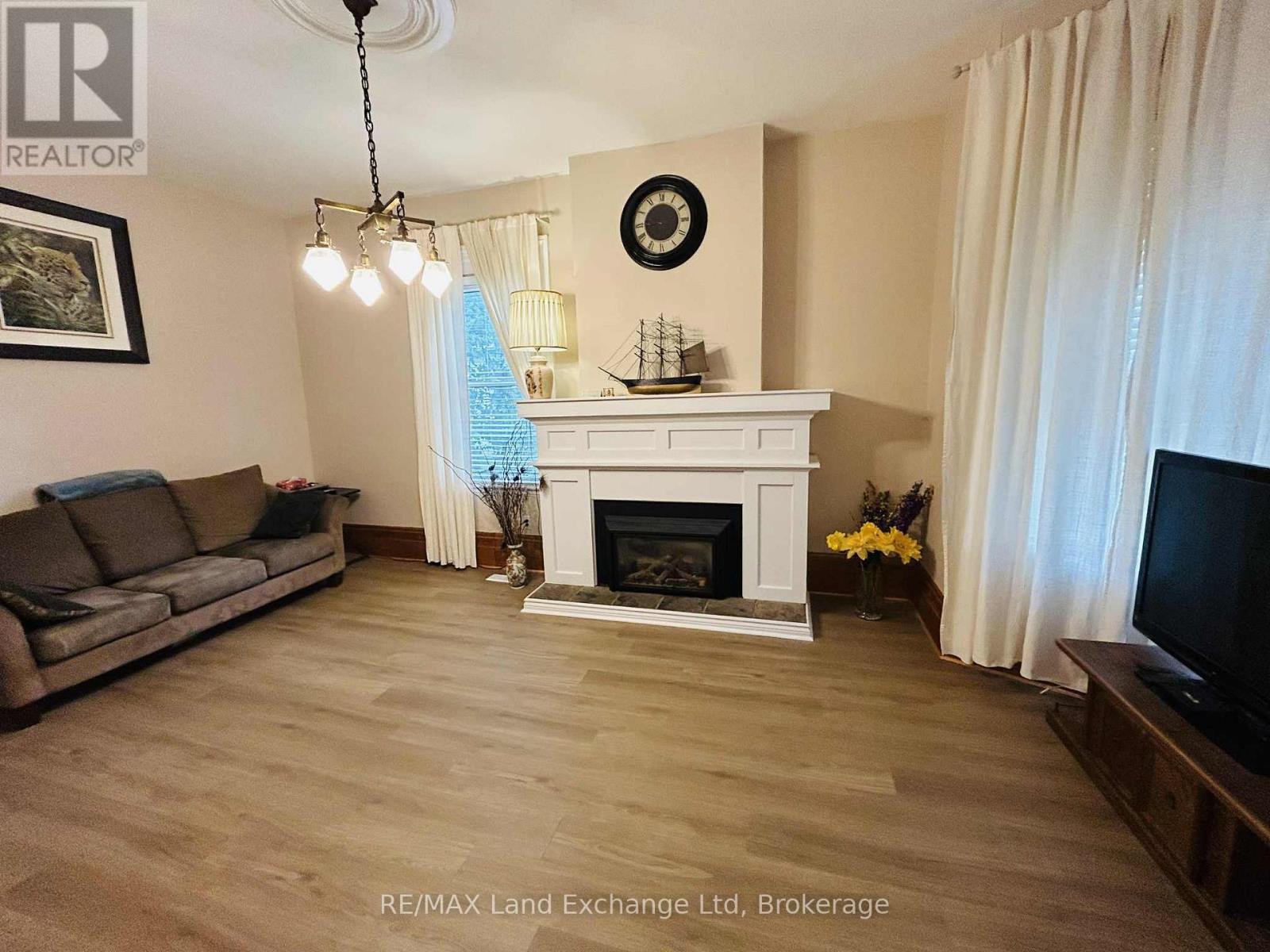81 Patrick Street E, North Huron (Wingham), ON - Indoor Photo Showing Living Room With Fireplace