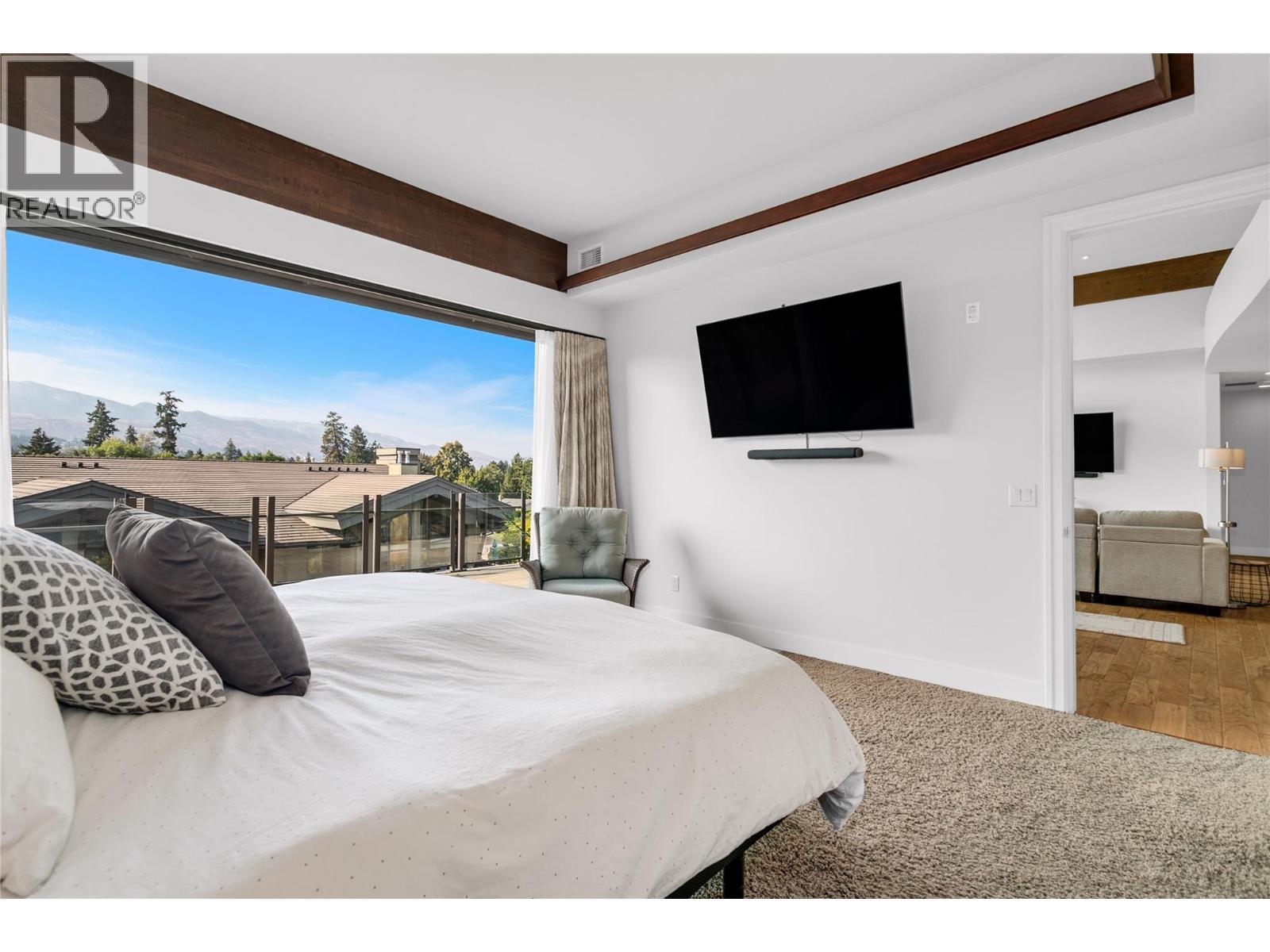 Primary Bedroom - Nano Wall - 580 Sarsons Road Unit# 407, Kelowna, BC - Indoor Photo Showing Bedroom