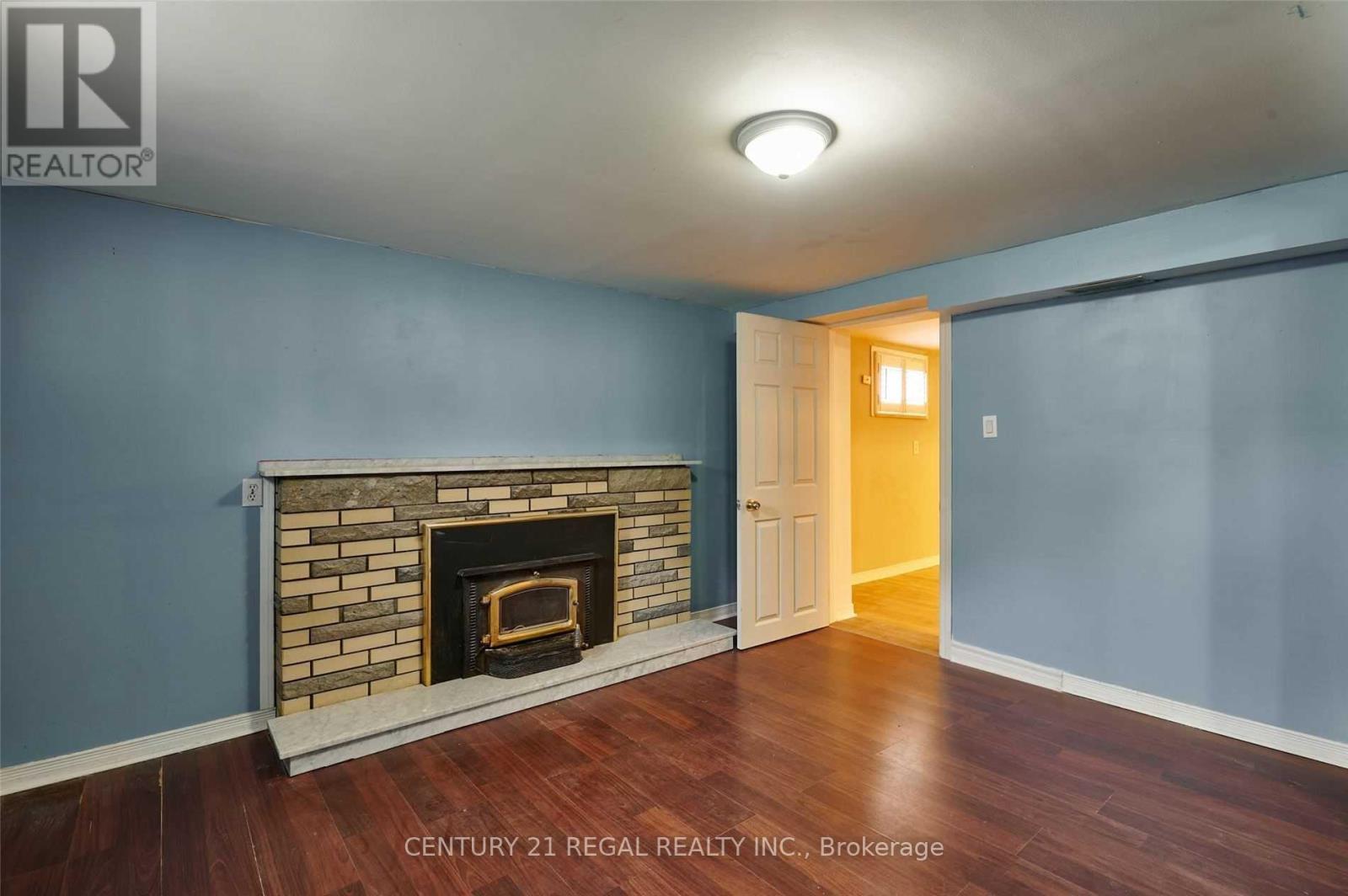 Bsmt - 559 Mccowan Road, Toronto, ON - Indoor Photo Showing Living Room With Fireplace