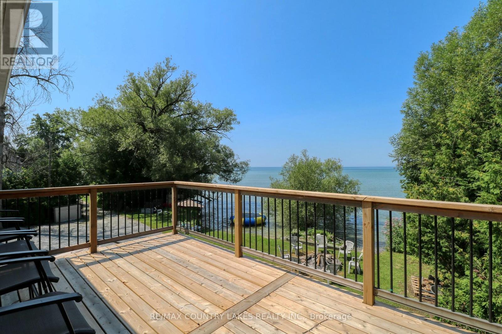 104 The Steps Road, Ramara, ON - Outdoor With Body Of Water With Balcony With Deck Patio Veranda With Exterior