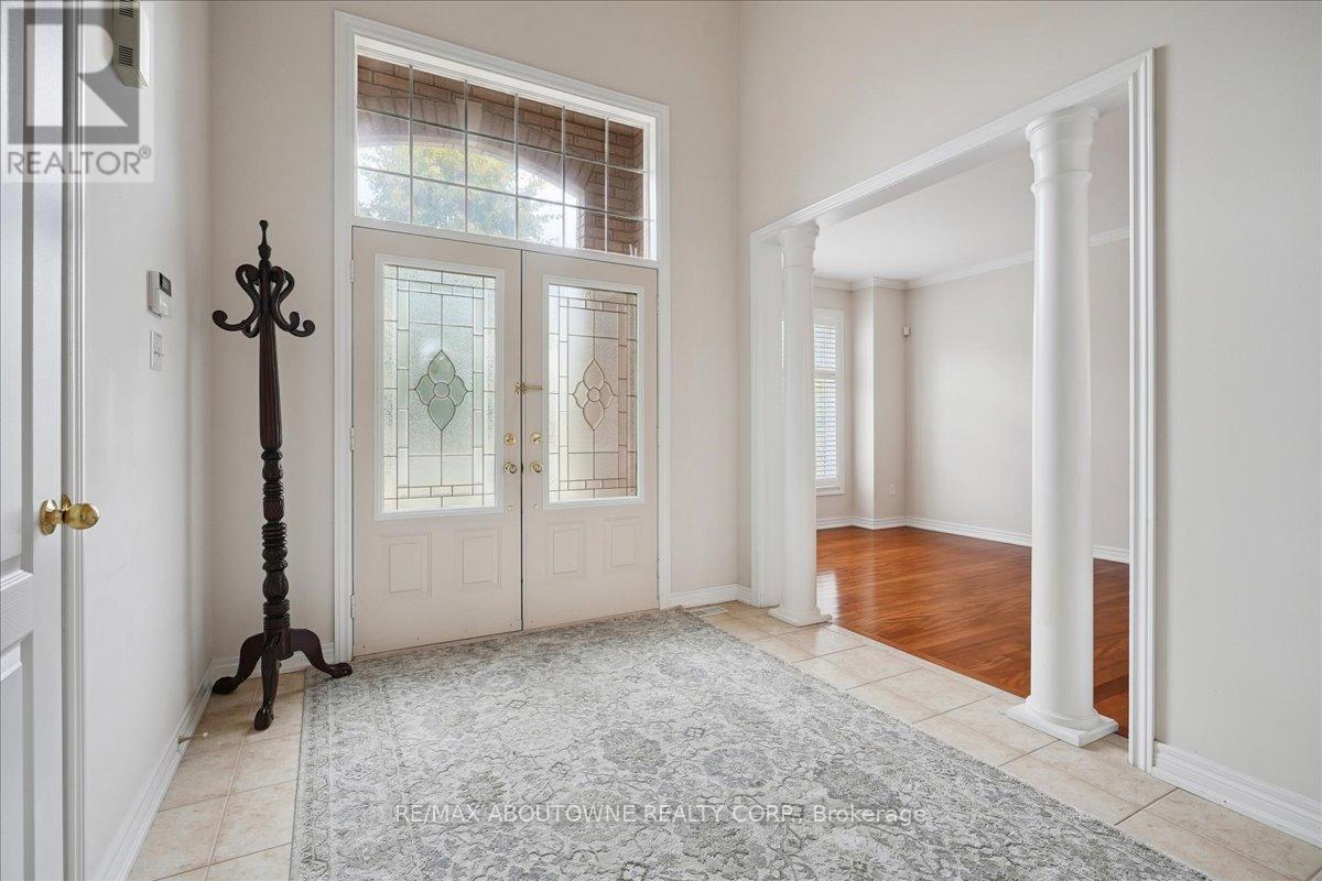 Spacious foyer with Vaulted 15' ceiling - 2348 Tesla Crescent, Oakville, ON - Indoor Photo Showing Other Room