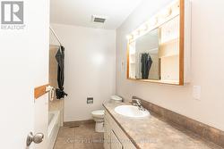 Bathroom 1 4pc (recroom level) -