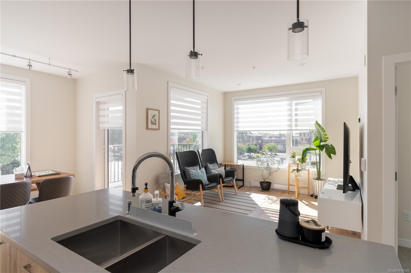 202-1588 North Dairy Rd, Saanich, BC - Indoor Photo Showing Kitchen With Double Sink