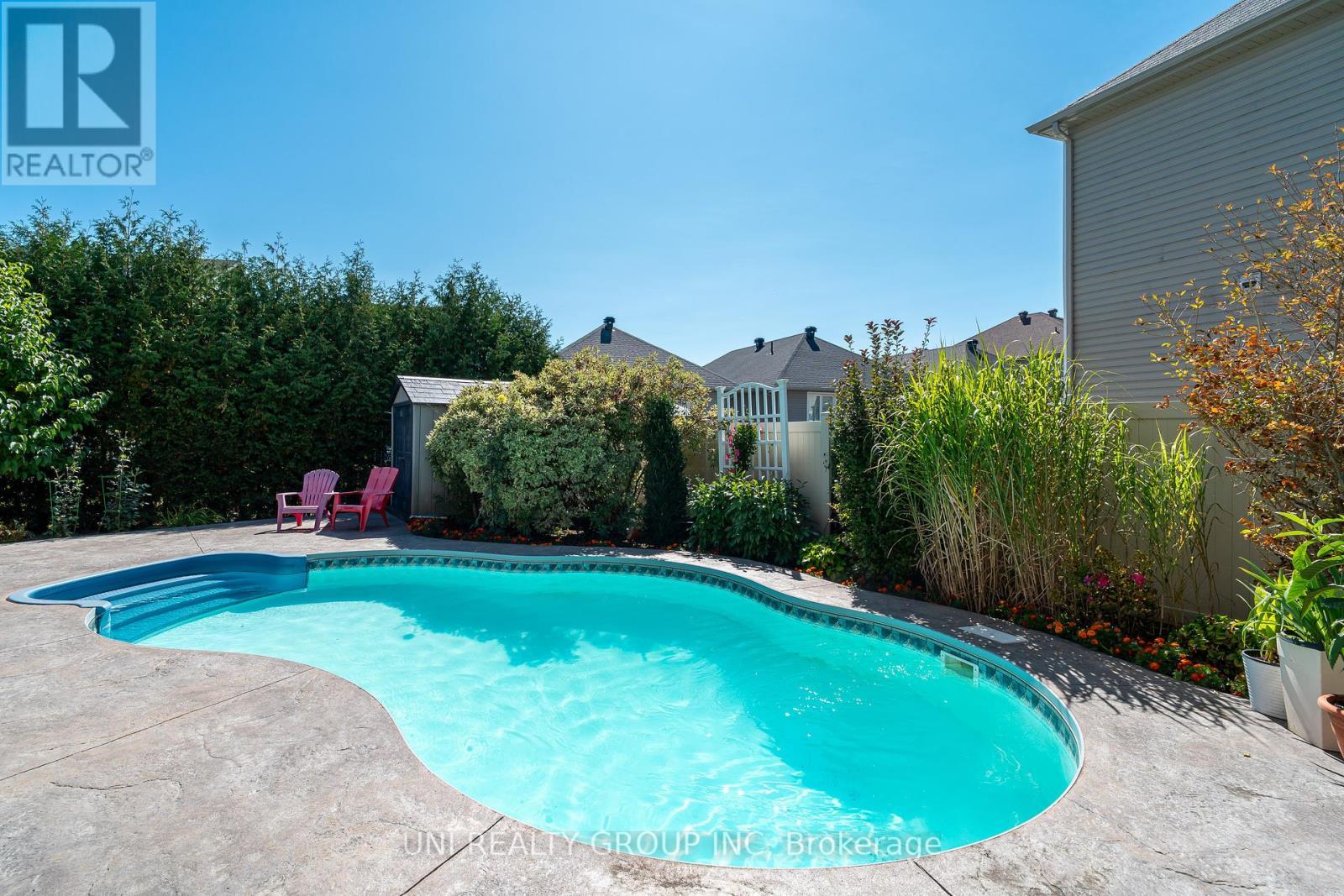 454 Cavesson Street, Ottawa, ON - Outdoor With In Ground Pool With Backyard