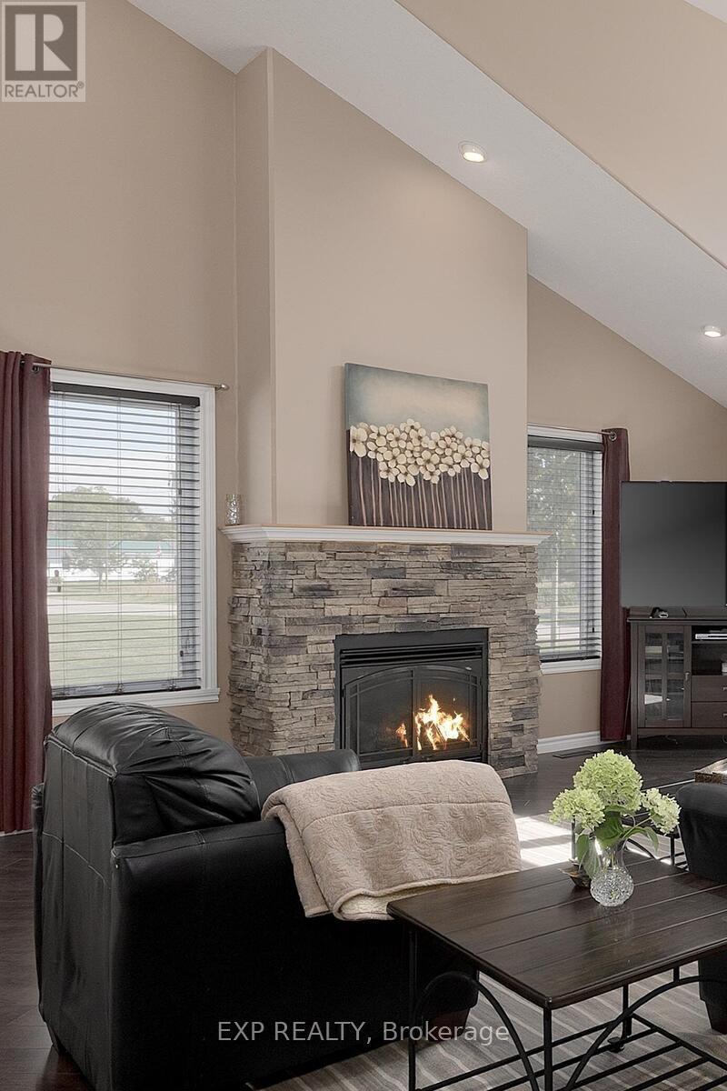 38 Fulton Street, Bayham (Vienna), ON - Indoor Photo Showing Living Room With Fireplace